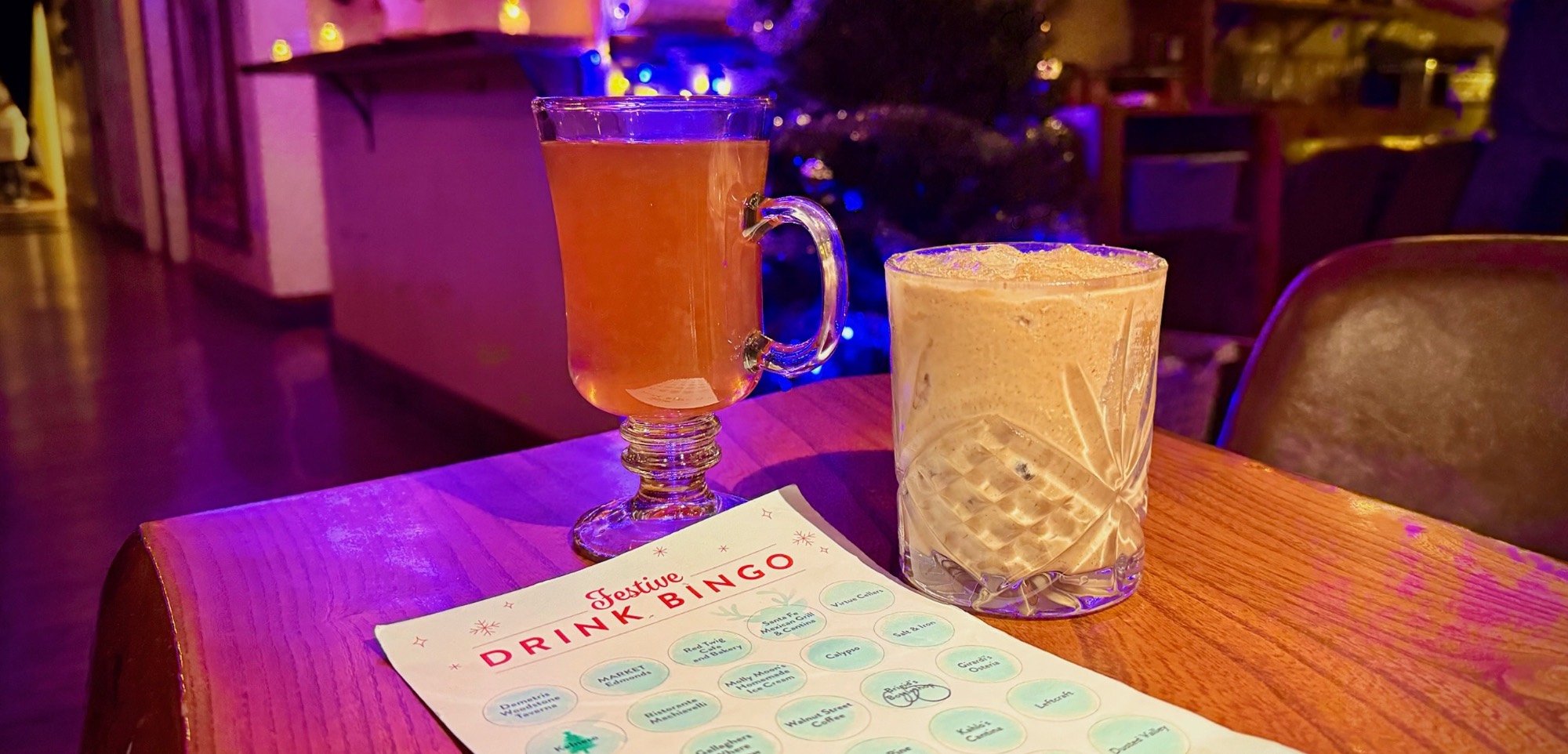 Two cocktails and a Festive Drink Bingo card at Kelnero in Edmonds WA
