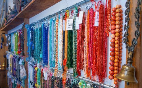 Beads hanging on a wall at Alexander's Bead Bazaar
