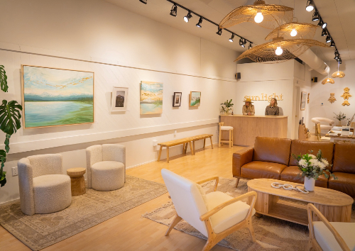 Interior of Sunlight Gallery + Studio in Edmonds with owners in background.